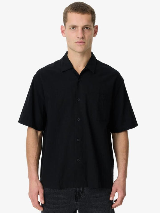 Image of a model wearing Tops. Productname: Article One Whelan Shirt in Black colour by brand - Article One