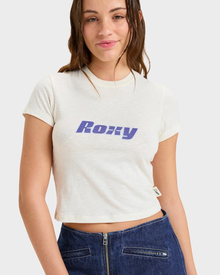 Image of a model wearing Tops. Productname: Roxy Womens Chloe Kim Baby T-Shirt Whisper White - in Whisper White colour by brand - Roxy