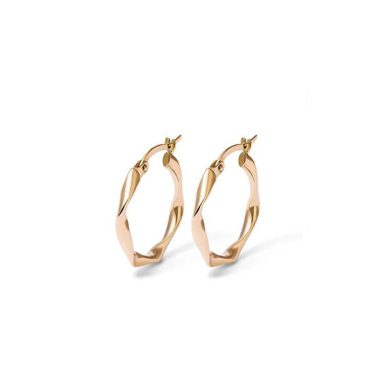 Image of Earrings. Productname: 15mm Ribbon Twist Hoop Earrings in 9kt Yellow Gold in Gold colour by brand - Bevilles