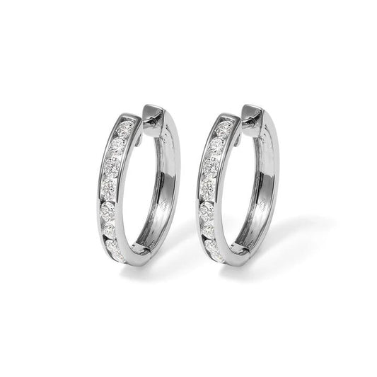 Image of Earrings. Productname: 18mm Channel Huggie Earrings with 1.00tw of Laboratory-Grown Diamonds in Sterling Silver with Platinum Coating in Diamond colour by brand - Bevilles
