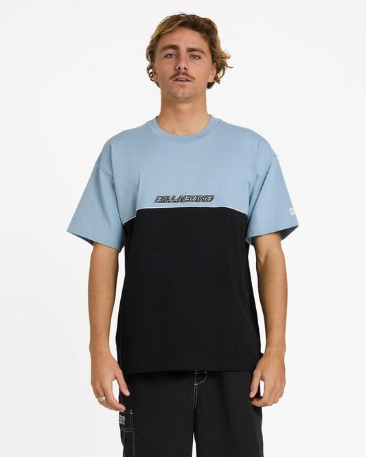 Image of a model wearing Tops. Productname: Billabong Mens Spec 73 Legacy T-Shirt Dusty Blue - in Dusty Blue colour by brand - Billabong