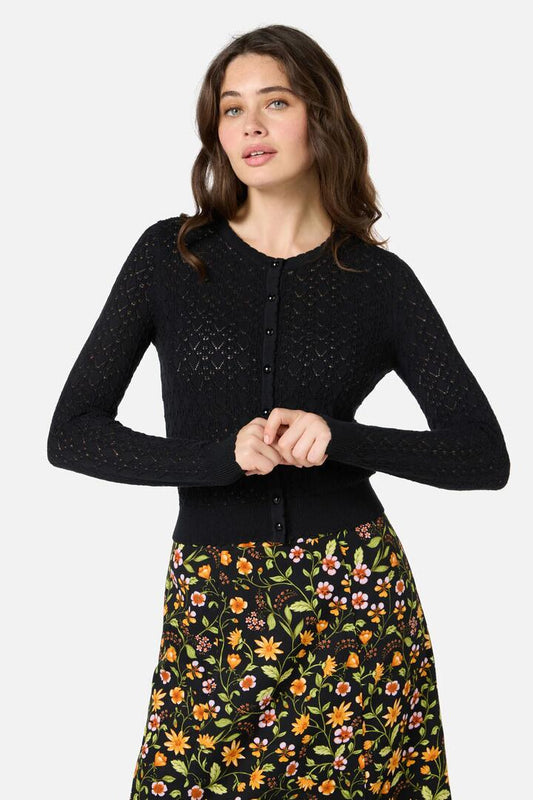 Image of a model wearing Outerwear. Productname: Clarissa Pointelle Cardigan in Black colour by brand - Princess Highway