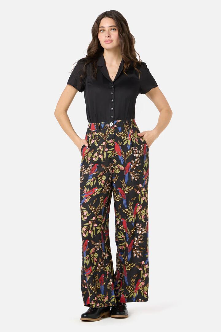 Image of a model wearing Pants. Productname: Rosella Printed Pant in Black colour by brand - Princess Highway