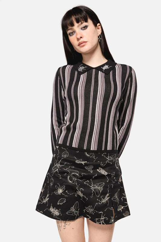 Image of a model wearing Tops. Productname: Dark Pieridae Striped Knit in Black/White colour by brand - Dangerfield