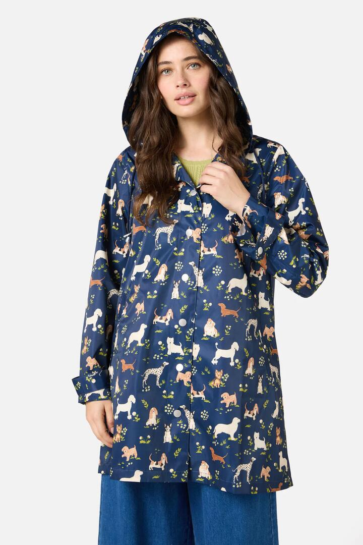 Image of a model wearing Rain Coats. Productname: Cute Dogs Raincoat in Navy colour by brand - Princess Highway