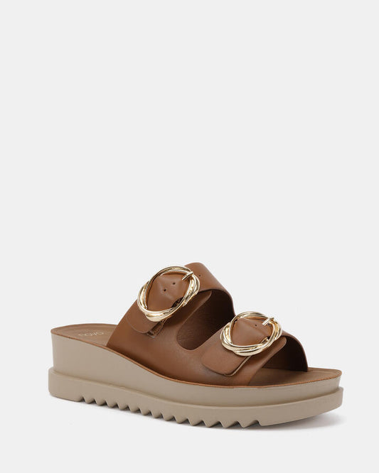 Image of Sandals. Product name - Bounce Caramel Wedge Sandals in Caramel colour by brand - Novo