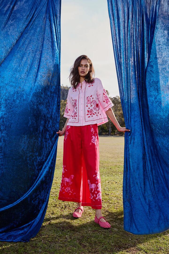 Image of a model wearing Pants. Product name - Ainslee Anglaise Pant in Red colour by brand - Gorman