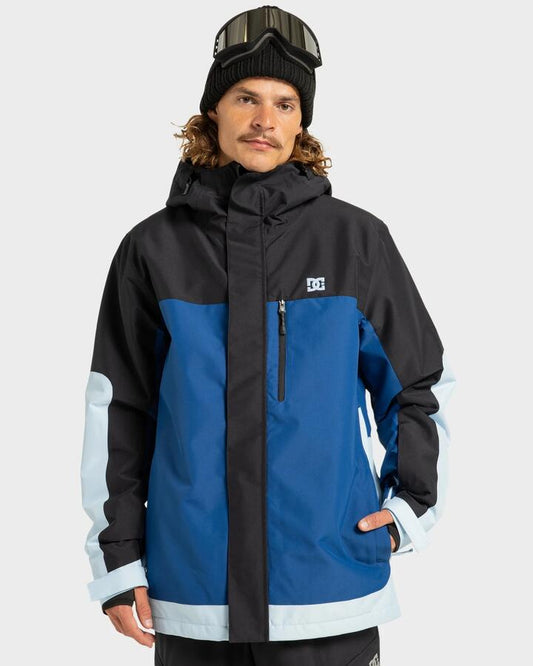 Image of a model wearing Outerwear. Productname: DC Shoes - Mens Defiant Insulated Jacket - Estate Blue - in Estate Blue colour by brand - DC Shoes