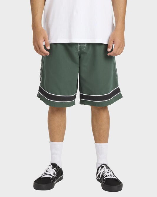Image of a model wearing Shorts. Product name - Billabong Mens Throw Ons 2.0 21" Swim Shorts Forest in Forest colour by brand - Billabong