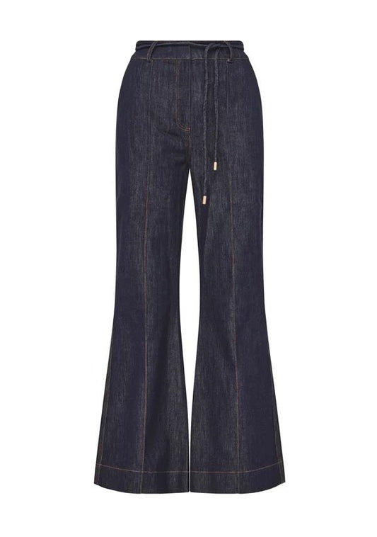 Image of a model wearing Pants. Productname: Diana Flare Pants in Deep Indigo colour by brand - MOS The Label