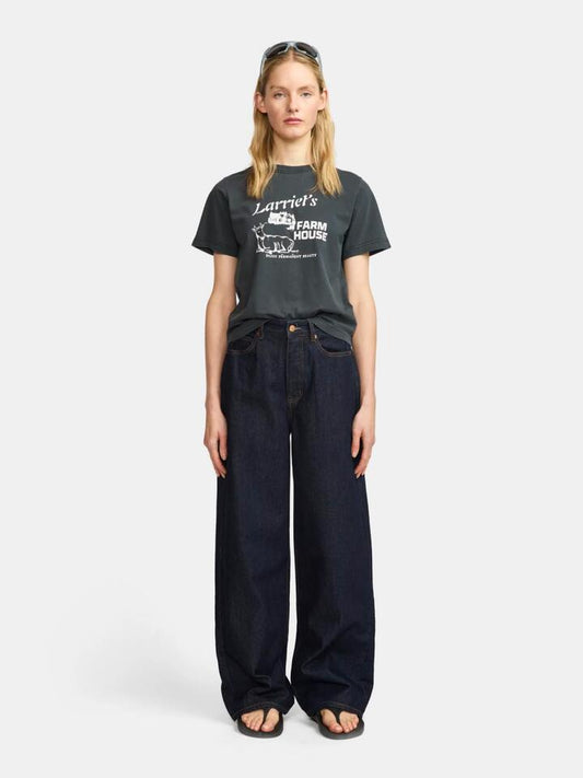 Image of a model wearing Tops. Productname: Larriet Farmhouse Tee in Used Black colour by brand - Larriet