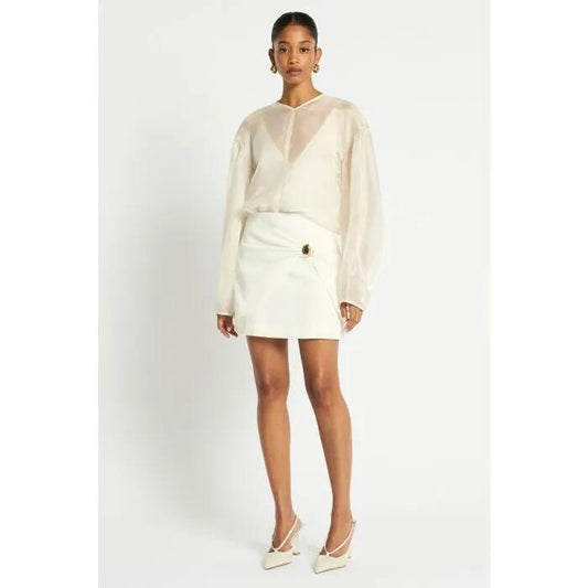 Image of a model wearing Skirts. Productname: Athena Skirt in Ivory colour by brand - sass and bide