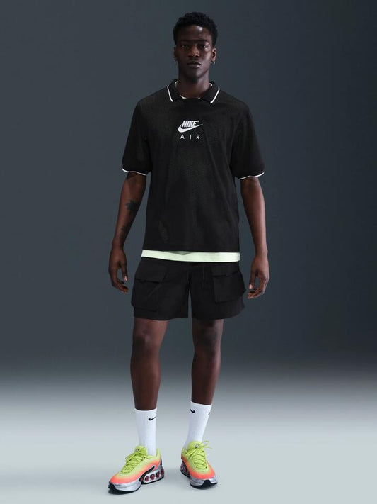 Image of a model wearing Tops. Productname: Nike Men's Air Football Jersey in Black/White colour by brand - Nike