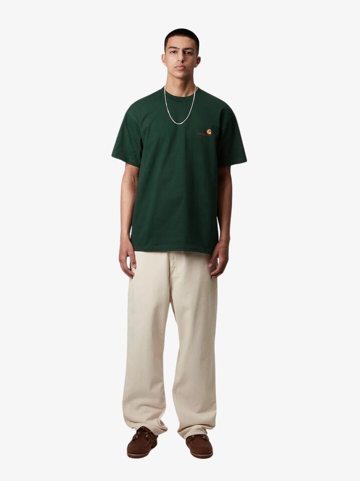 Image of a model wearing Tops. Productname: Carhartt Wip S/S American Script T-Shirt in Conifer colour by brand - Carhartt Wip