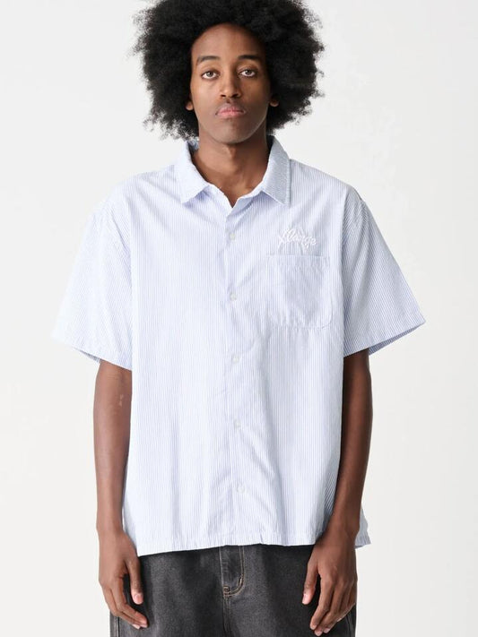 Image of a model wearing Shorts. Productname: Xlarge Warp Short Sleeve Shirt in BLUE colour by brand - Xlarge