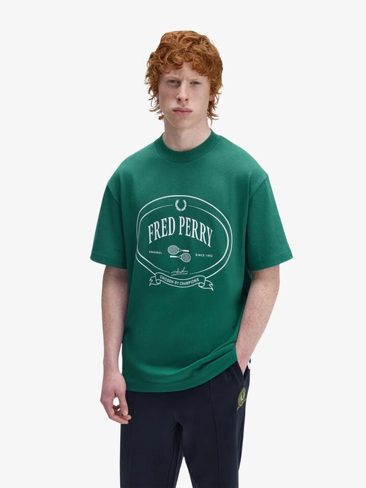 Image of a model wearing Tops. Productname: Fred Perry Chosen By Champions T-Shirt in Sport Green colour by brand - Fred Perry