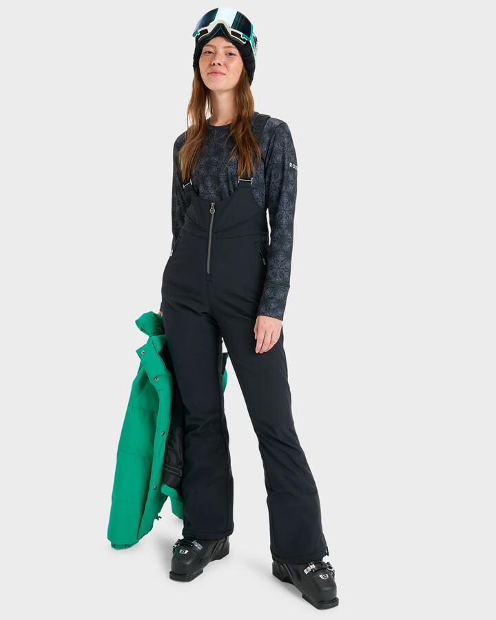 Image of a model wearing Pants. Product name - Roxy Womens Summit Bib Snow Pants True Black in True Black colour by brand - Roxy