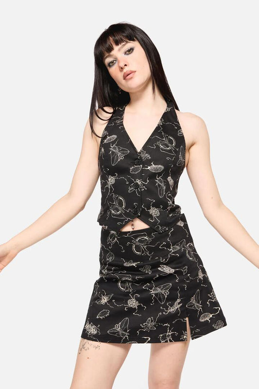 Image of a model wearing Tops. Productname: Dark Pieridae Print Halter Neck Vest Top in Black colour by brand - Dangerfield