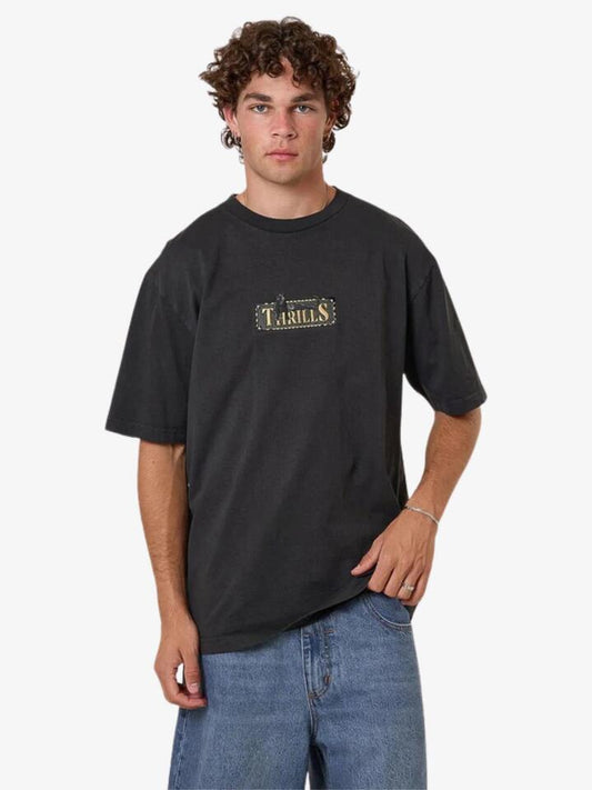 Image of a model wearing Tops. Productname: Thrills Pit Stop Oversize Fit Tee in Pirate Black colour by brand - Thrills