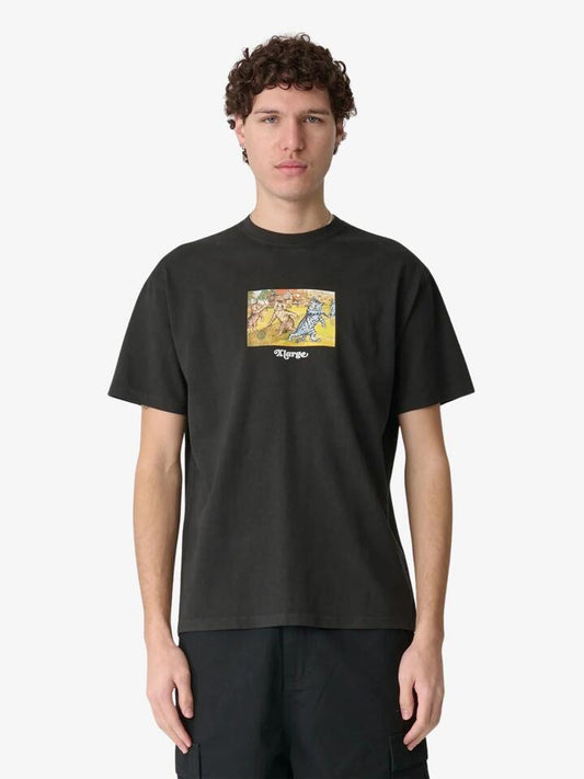 Image of a model wearing Tops. Productname: Xlarge Challenge Short Sleeve Tee in Black colour by brand - Xlarge