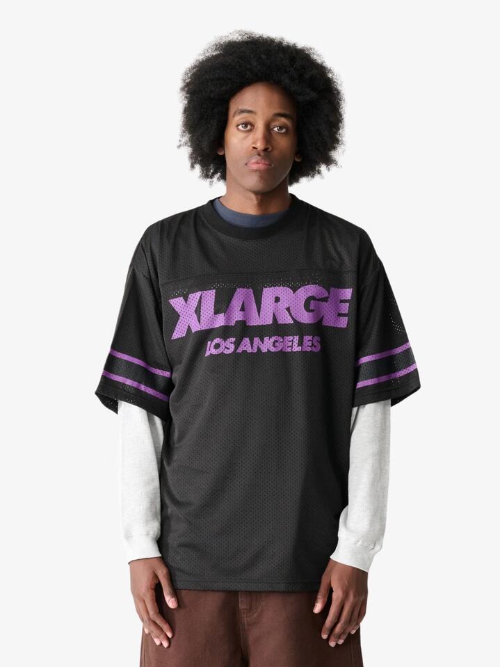 Image of a model wearing Tops. Productname: Xlarge Burning Peace Match Tee in BLACK colour by brand - Xlarge