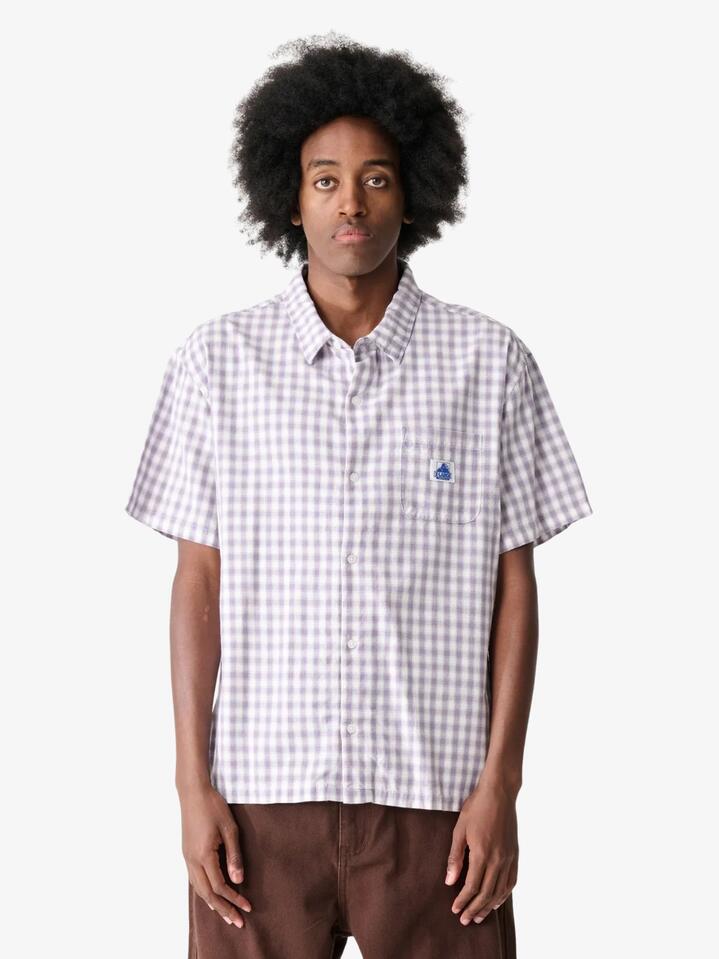 Image of a model wearing Tops. Productname: Xlarge Bill Ss Shirt in LAVENDER colour by brand - Xlarge