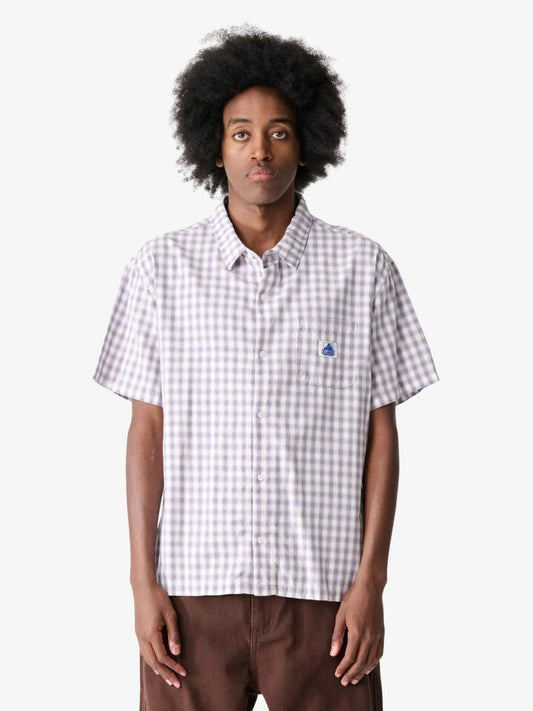 Image of a model wearing Shorts. Productname: Xlarge Bill Short Sleeve Shirt in LAVENDER colour by brand - Xlarge
