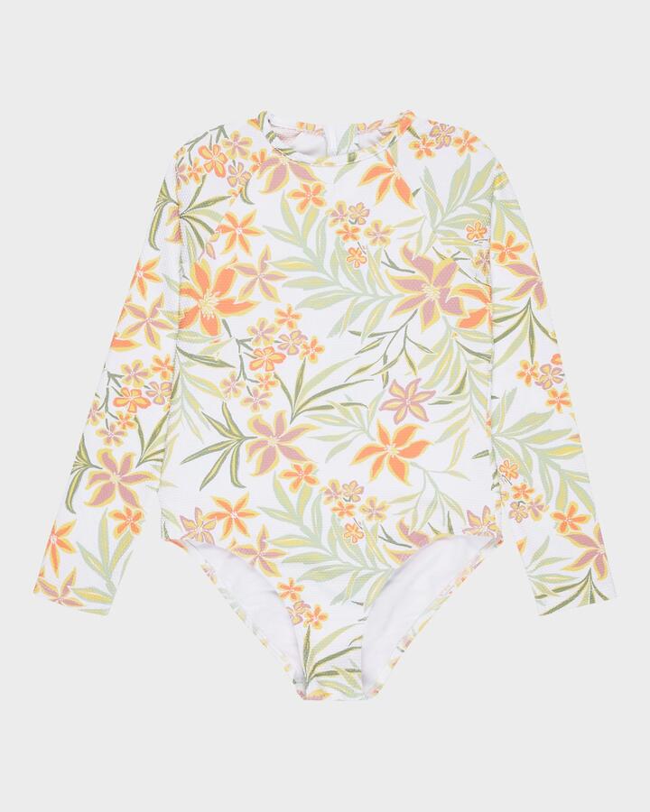 Image of a model wearing Tops. Product name - Roxy Girls 8-16 Floral Horizon Long Sleeve Onesie Rash Vest Bright White Floral Horizon in Bright White Floral Horizon colour by brand - Roxy
