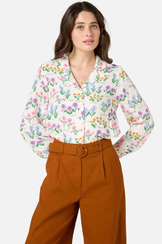 Image of a model wearing Tops. Productname: Cottage Garden Blouse in Cream colour by brand - Princess Highway