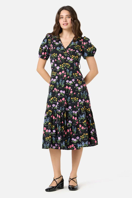Image of a model wearing Dress. Productname: Cottage Garden Midi Wrap Dress in Black colour by brand - Princess Highway