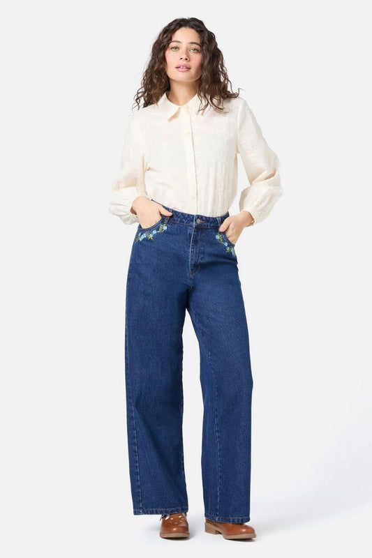 Image of a model wearing Denim. Productname: Blue Blooms Embroidered Jean in Blue Denim colour by brand - Princess Highway