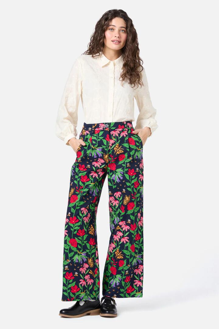 Image of a model wearing Pants. Productname: Garden Party Pant in Navy colour by brand - Princess Highway