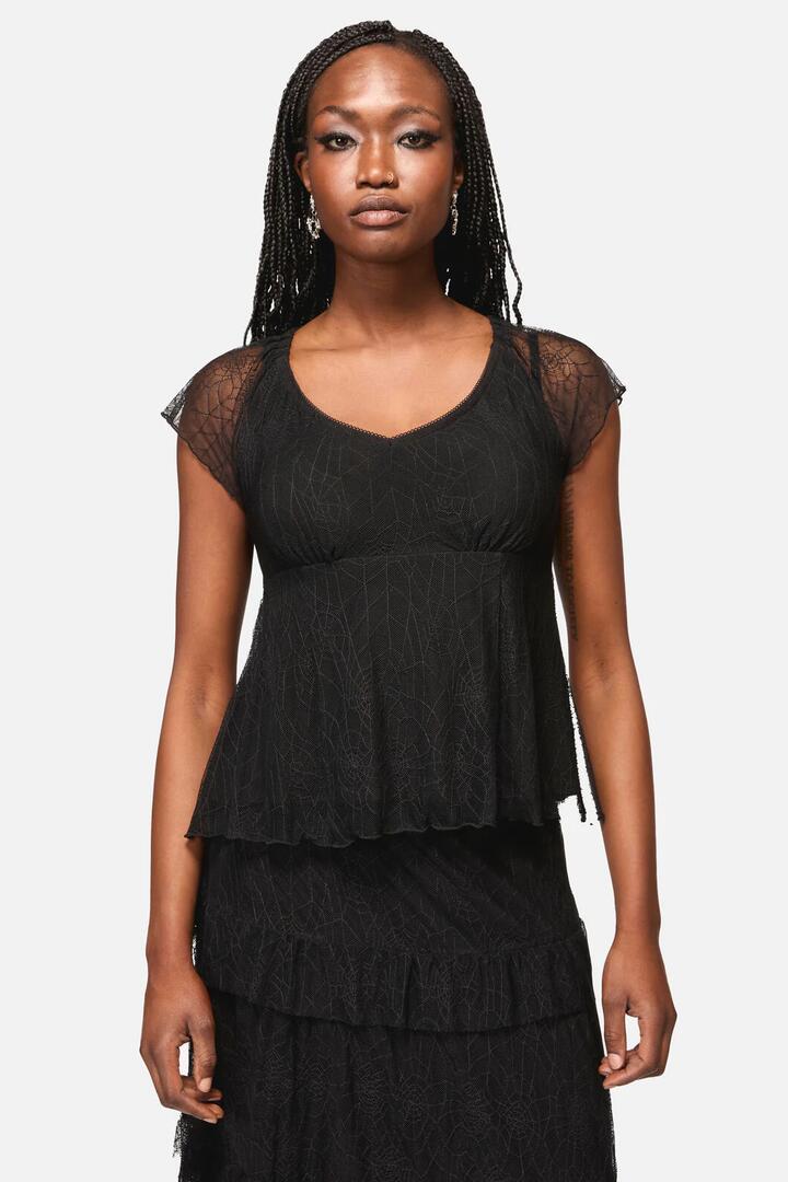 Image of a model wearing Tops. Productname: Web Lace Babydoll Top in Black colour by brand - Black Friday