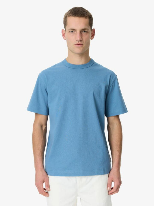 Image of a model wearing Tops. Productname: Article One Heavyweight Tee in Washed Blue colour by brand - Article One