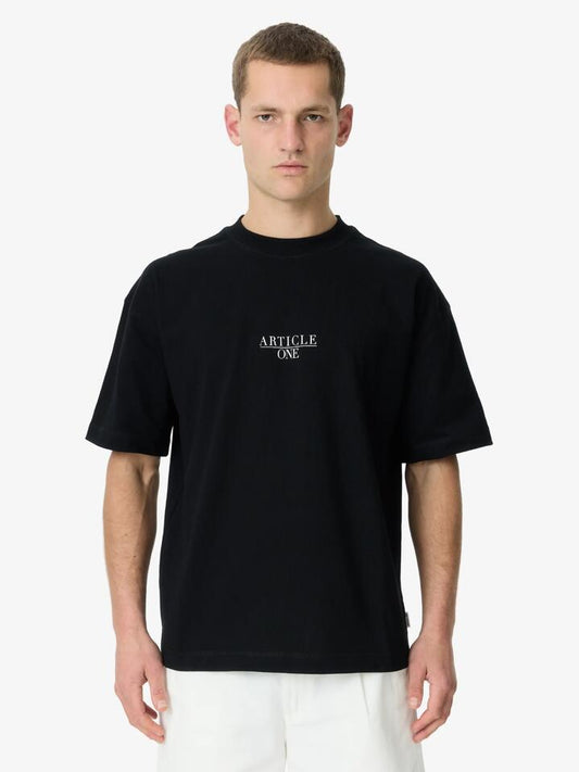Image of a model wearing Tops. Productname: Article One Nice Serif Tee in Black colour by brand - Article One