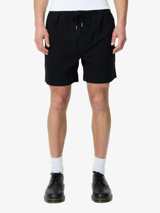 Image of a model wearing Shorts. Productname: Article One Luigi Linen Short in Black colour by brand - Article One