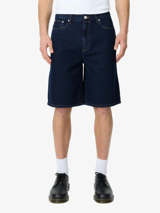 Image of a model wearing Denim. Productname: Article One Bertie Jean Short in Indigo Stone colour by brand - Article One