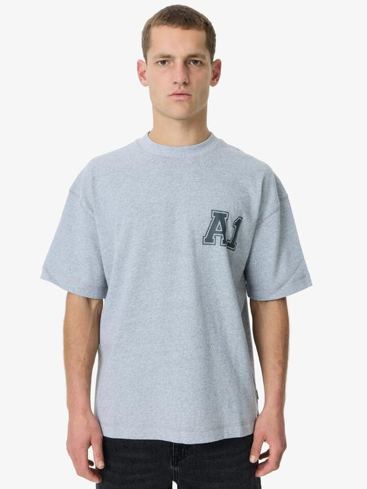 Image of a model wearing Tops. Productname: Article One Team Tee in Grey Marle colour by brand - Article One