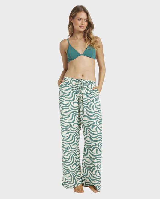Image of a model wearing Pants. Productname: Billabong - Womens All The Waves Pants - Evergreen - in Evergreen colour by brand - Billabong