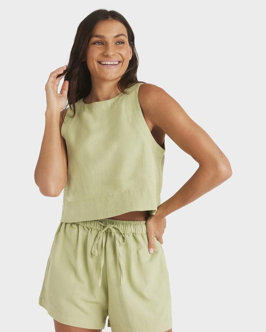 Image of a model wearing Tops. Product name - Roxy Womens Armor Tank Top Pistachio in Pistachio colour by brand - Roxy