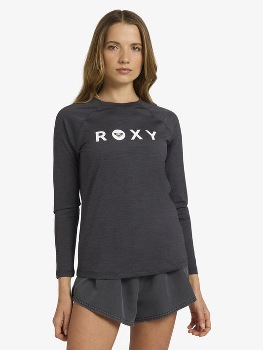 Image of a model wearing Tops. Productname: Roxy - Womens Essentials Lycra Long Sleeve Rash Vest - Anthracite - in Anthracite colour by brand - Roxy