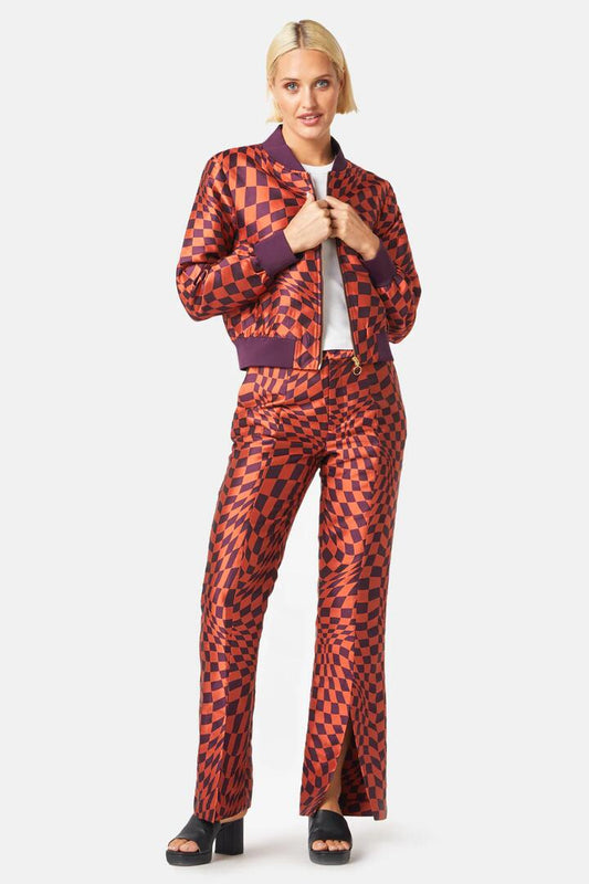 Image of a model wearing Pants. Product name - Warped Check Jacquard Pant in Check colour by brand - Gorman