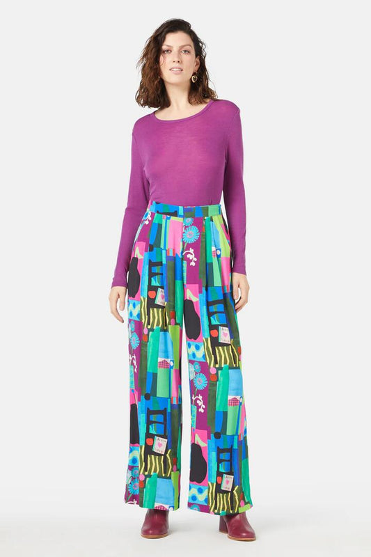 Image of a model wearing Pants. Product name - Collage Notes Pant in Print colour by brand - Gorman