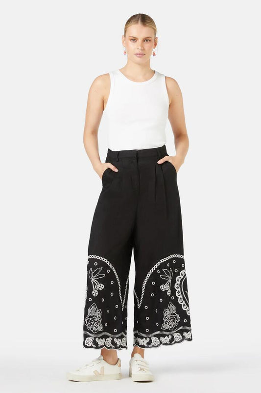 Image of a model wearing Pants. Product name - Romance Anglaise Pant in Black colour by brand - Gorman