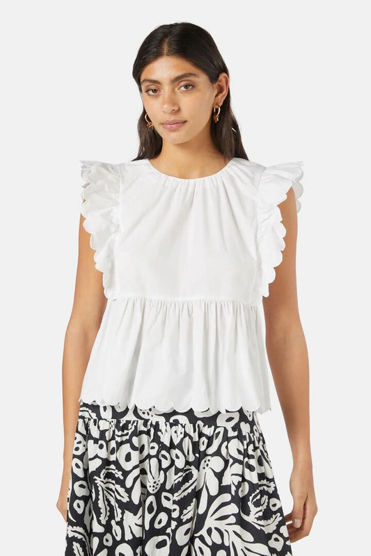 Image of a model wearing Tops. Productname: Lily Ruffle Top in White colour by brand - Gorman
