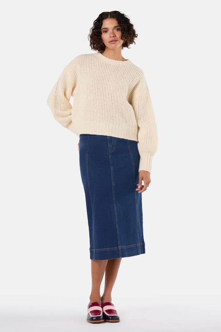 Image of a model wearing Outerwear. Product name - Lucia Jumper in Cream colour by brand - Gorman