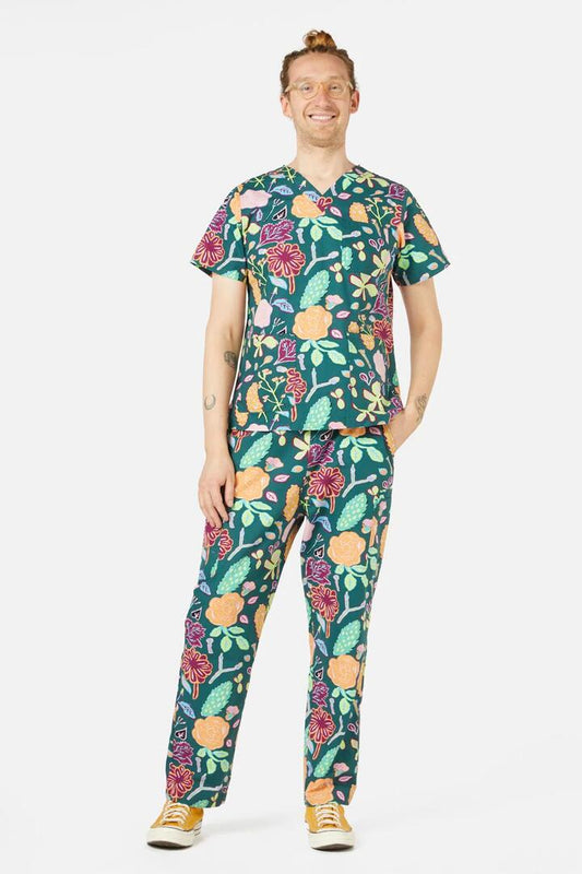 Image of a model wearing Uniforms & Workwear. Product name - Pitched Petals Scrub Set in Green colour by brand - Gorman
