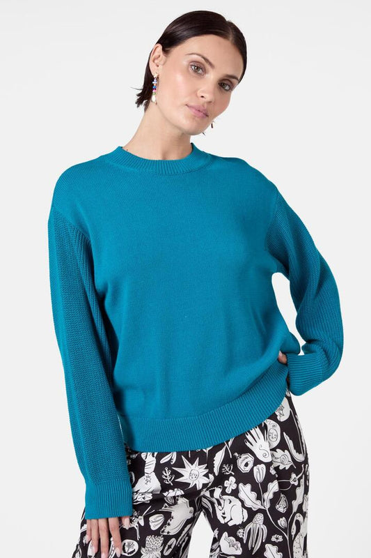 Image of a model wearing Outerwear. Productname: Aura Jumper in Teal colour by brand - Gorman