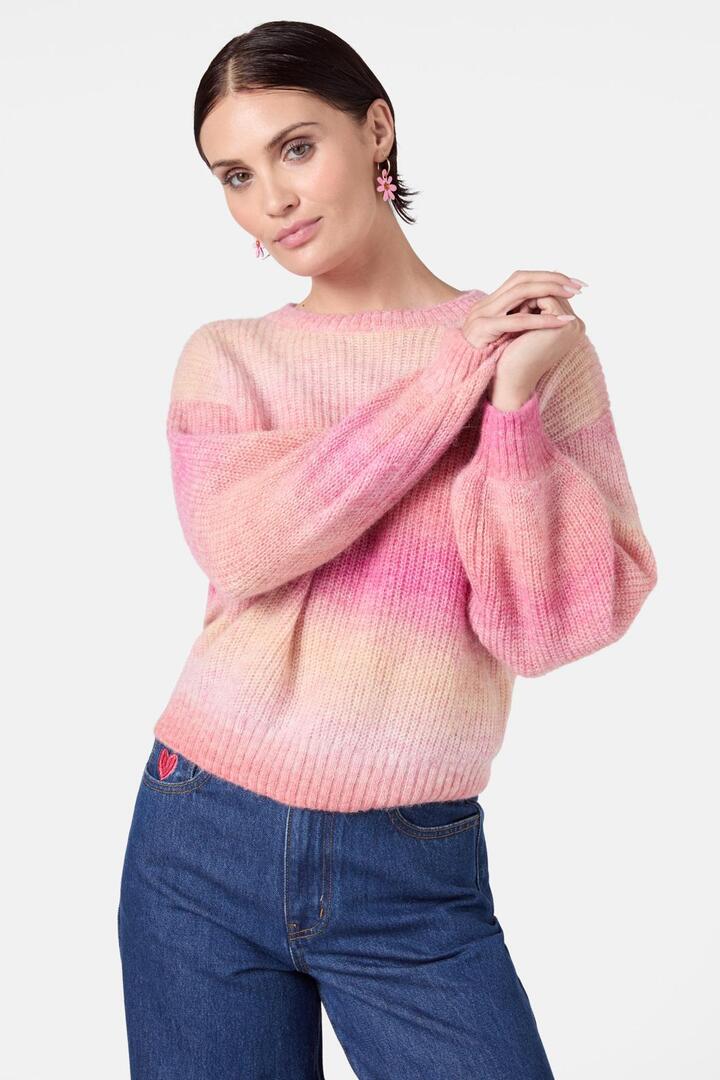 Image of a model wearing Outerwear. Product name - Calypso Sky Jumper in Pink colour by brand - Gorman