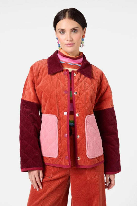 Image of a model wearing Outerwear. Productname: Heirloom Reversible Quilted Jacket in Print colour by brand - Gorman